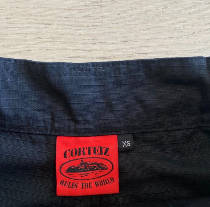 Corteiz Guerillaz Cargo Pants Black/Red 